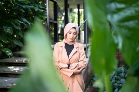 Cyberjaya, Malaysia â 25 December 2019: Fashion portraiture of young beautiful muslim woman wearing hijab.のeditorial素材
