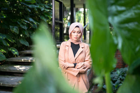 Cyberjaya, Malaysia â 25 December 2019: Fashion portraiture of young beautiful muslim woman wearing hijab.のeditorial素材