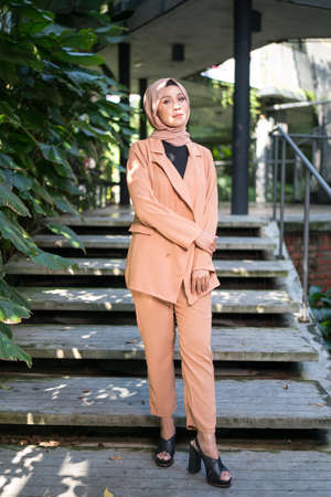 Cyberjaya, Malaysia â 25 December 2019: Fashion portraiture of young beautiful muslim woman wearing hijab.のeditorial素材