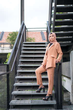 Cyberjaya, Malaysia â 25 December 2019: Fashion portraiture of young beautiful muslim woman wearing hijab.のeditorial素材