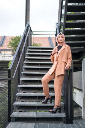 Cyberjaya, Malaysia â 25 December 2019: Fashion portraiture of young beautiful muslim woman wearing hijab.のeditorial素材