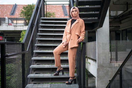Cyberjaya, Malaysia â 25 December 2019: Fashion portraiture of young beautiful muslim woman wearing hijab.のeditorial素材