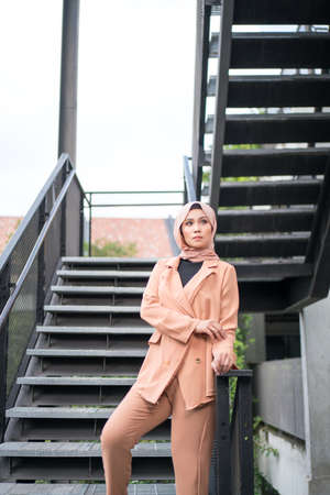 Cyberjaya, Malaysia â 25 December 2019: Fashion portraiture of young beautiful muslim woman wearing hijab.のeditorial素材