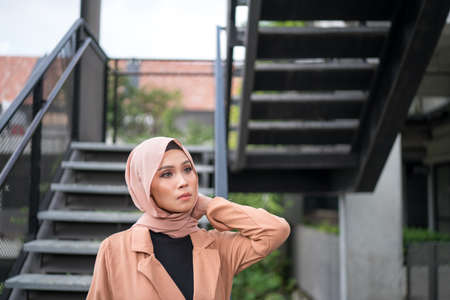 Cyberjaya, Malaysia â 25 December 2019: Fashion portraiture of young beautiful muslim woman wearing hijab.のeditorial素材