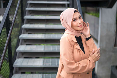 Cyberjaya, Malaysia â 25 December 2019: Fashion portraiture of young beautiful muslim woman wearing hijab.のeditorial素材