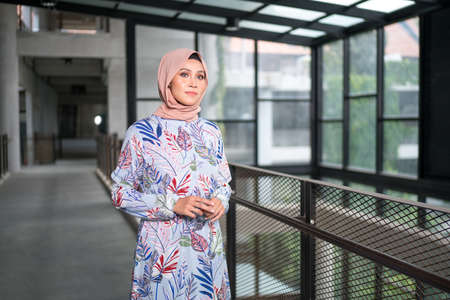 Cyberjaya, Malaysia â 25 December 2019: Fashion portraiture of young beautiful muslim woman wearing hijab.のeditorial素材