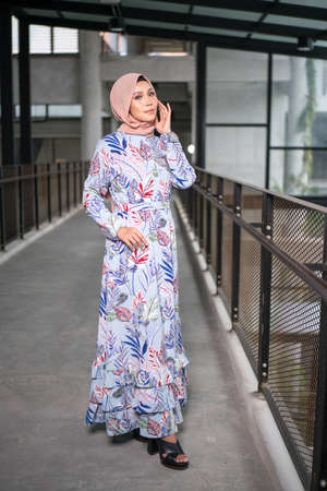 Cyberjaya, Malaysia â 25 December 2019: Fashion portraiture of young beautiful muslim woman wearing hijab.のeditorial素材