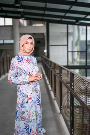 Cyberjaya, Malaysia â 25 December 2019: Fashion portraiture of young beautiful muslim woman wearing hijab.のeditorial素材
