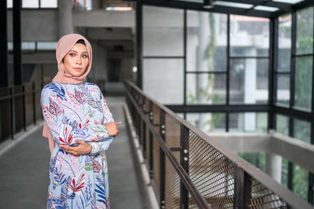 Cyberjaya, Malaysia â 25 December 2019: Fashion portraiture of young beautiful muslim woman wearing hijab.のeditorial素材