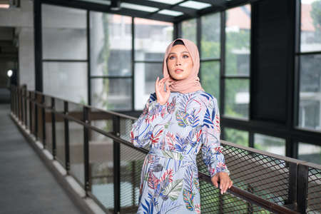 Cyberjaya, Malaysia â 25 December 2019: Fashion portraiture of young beautiful muslim woman wearing hijab.のeditorial素材