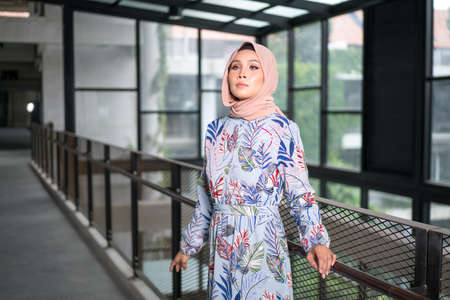 Cyberjaya, Malaysia â 25 December 2019: Fashion portraiture of young beautiful muslim woman wearing hijab.のeditorial素材