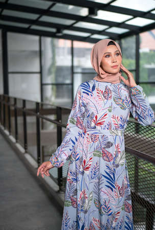 Cyberjaya, Malaysia â 25 December 2019: Fashion portraiture of young beautiful muslim woman wearing hijab.のeditorial素材