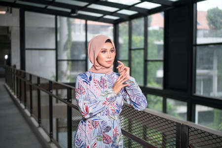 Cyberjaya, Malaysia â 25 December 2019: Fashion portraiture of young beautiful muslim woman wearing hijab.のeditorial素材