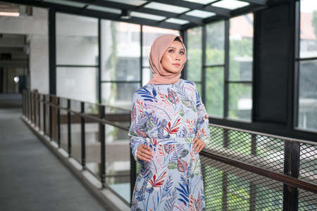 Cyberjaya, Malaysia â 25 December 2019: Fashion portraiture of young beautiful muslim woman wearing hijab.のeditorial素材