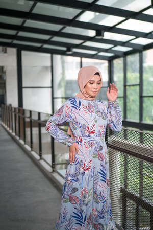 Cyberjaya, Malaysia â 25 December 2019: Fashion portraiture of young beautiful muslim woman wearing hijab.のeditorial素材