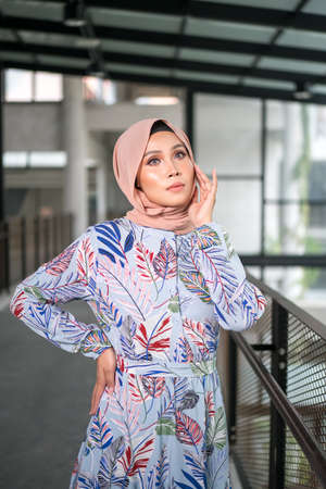 Cyberjaya, Malaysia â 25 December 2019: Fashion portraiture of young beautiful muslim woman wearing hijab.のeditorial素材