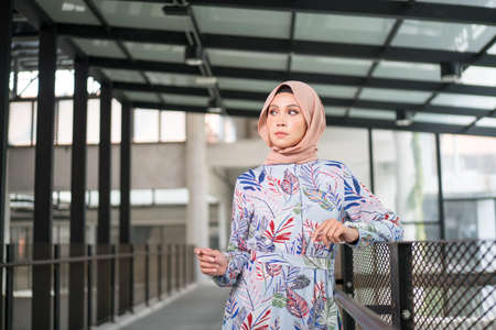 Cyberjaya, Malaysia  25 December 2019: Fashion portraiture of young beautiful muslim woman wearing hijab.のeditorial素材