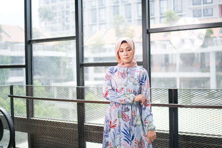 Cyberjaya, Malaysia â 25 December 2019: Fashion portraiture of young beautiful muslim woman wearing hijab.のeditorial素材