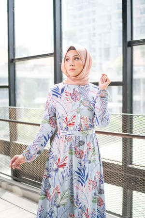 Cyberjaya, Malaysia â 25 December 2019: Fashion portraiture of young beautiful muslim woman wearing hijab.のeditorial素材
