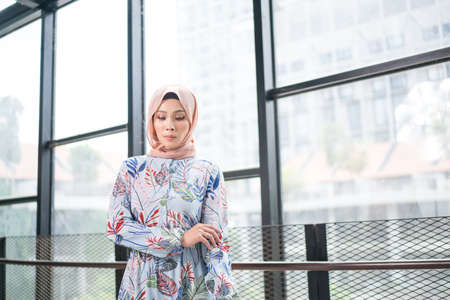 Cyberjaya, Malaysia â 25 December 2019: Fashion portraiture of young beautiful muslim woman wearing hijab.のeditorial素材