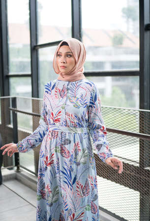 Cyberjaya, Malaysia â 25 December 2019: Fashion portraiture of young beautiful muslim woman wearing hijab.のeditorial素材
