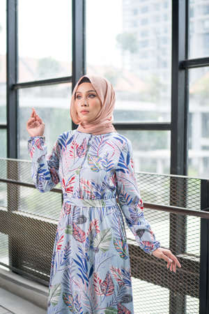 Cyberjaya, Malaysia â 25 December 2019: Fashion portraiture of young beautiful muslim woman wearing hijab.のeditorial素材