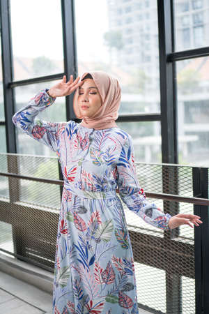 Cyberjaya, Malaysia â 25 December 2019: Fashion portraiture of young beautiful muslim woman wearing hijab.のeditorial素材