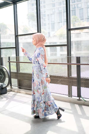 Cyberjaya, Malaysia â 25 December 2019: Fashion portraiture of young beautiful muslim woman wearing hijab.のeditorial素材