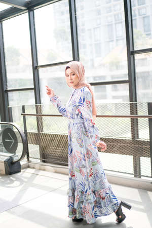 Cyberjaya, Malaysia â 25 December 2019: Fashion portraiture of young beautiful muslim woman wearing hijab.のeditorial素材