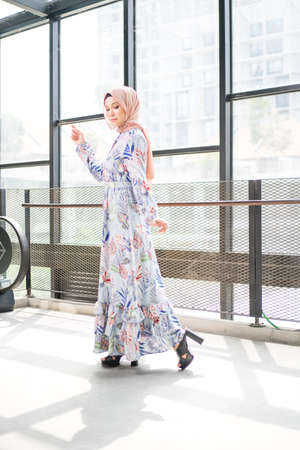 Cyberjaya, Malaysia â 25 December 2019: Fashion portraiture of young beautiful muslim woman wearing hijab.のeditorial素材
