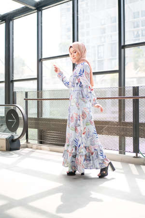 Cyberjaya, Malaysia â 25 December 2019: Fashion portraiture of young beautiful muslim woman wearing hijab.のeditorial素材