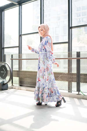 Cyberjaya, Malaysia â 25 December 2019: Fashion portraiture of young beautiful muslim woman wearing hijab.のeditorial素材