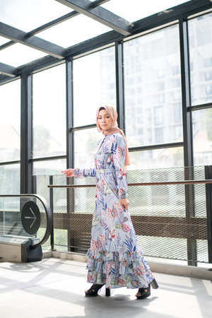 Cyberjaya, Malaysia â 25 December 2019: Fashion portraiture of young beautiful muslim woman wearing hijab.のeditorial素材
