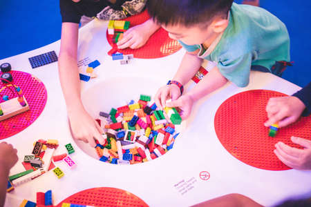 Kuala Lumpur, Malaysia â December, 2019: Children play with Lego blocks at Pavilion Shopping Mall in Bukit Bintang.のeditorial素材