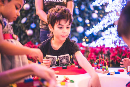 Kuala Lumpur, Malaysia â December, 2019: Children play with Lego blocks at Pavilion Shopping Mall in Bukit Bintang.のeditorial素材