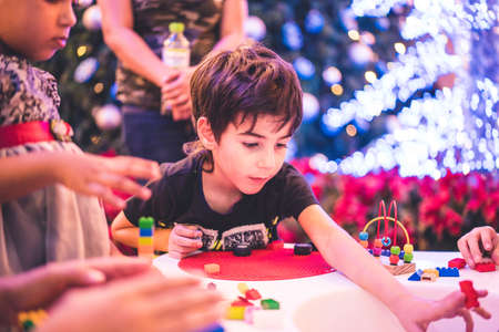 Kuala Lumpur, Malaysia â December, 2019: Children play with Lego blocks at Pavilion Shopping Mall in Bukit Bintang.のeditorial素材
