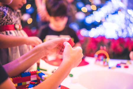 Kuala Lumpur, Malaysia â December, 2019: Children play with Lego blocks at Pavilion Shopping Mall in Bukit Bintang.のeditorial素材