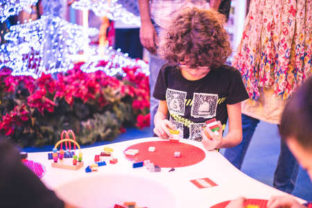 Kuala Lumpur, Malaysia â December, 2019: Children play with Lego blocks at Pavilion Shopping Mall in Bukit Bintang.のeditorial素材