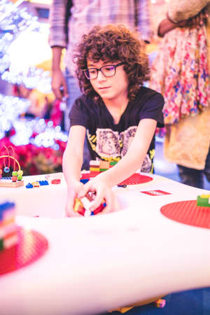 Kuala Lumpur, Malaysia â December, 2019: Children play with Lego blocks at Pavilion Shopping Mall in Bukit Bintang.のeditorial素材