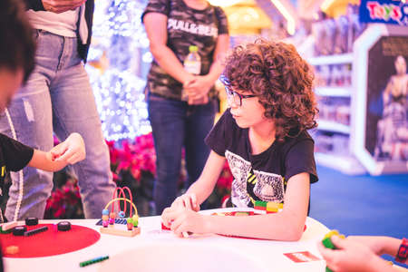 Kuala Lumpur, Malaysia â December, 2019: Children play with Lego blocks at Pavilion Shopping Mall in Bukit Bintang.のeditorial素材