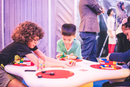 Kuala Lumpur, Malaysia â December, 2019: Children play with Lego blocks at Pavilion Shopping Mall in Bukit Bintang.のeditorial素材