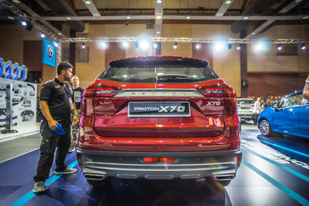Kuala Lumpur, Malaysia  April 11, 2019  Car and motocycle displayed at Moto Show in Kuala Lumpur. Exhibitors present most interesting aspects of the automotive industry. The image contains certain grain or noise and soft focus.のeditorial素材