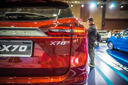 Kuala Lumpur, Malaysia â April 11, 2019 â Car and motocycle displayed at Moto Show in Kuala Lumpur. Exhibitors present most interesting aspects of the automotive industry. The image contains certain grain or noise and soft focus.のeditorial素材