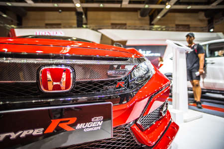 Kuala Lumpur, Malaysia â April 11, 2019 â Car and motocycle displayed at Moto Show in Kuala Lumpur. Exhibitors present most interesting aspects of the automotive industry. The image contains certain grain or noise and soft focus.のeditorial素材