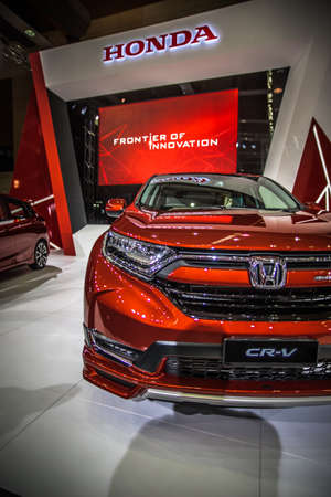 Kuala Lumpur, Malaysia â April 11, 2019 â Car and motocycle displayed at Moto Show in Kuala Lumpur. Exhibitors present most interesting aspects of the automotive industry. The image contains certain grain or noise and soft focus.のeditorial素材