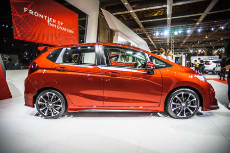 Kuala Lumpur, Malaysia â April 11, 2019 â Car and motocycle displayed at Moto Show in Kuala Lumpur. Exhibitors present most interesting aspects of the automotive industry. The image contains certain grain or noise and soft focus.のeditorial素材