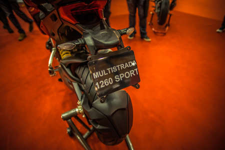 Kuala Lumpur, Malaysia â April 11, 2019 â Car and motocycle displayed at Moto Show in Kuala Lumpur. Exhibitors present most interesting aspects of the automotive industry. The image contains certain grain or noise and soft focus.のeditorial素材