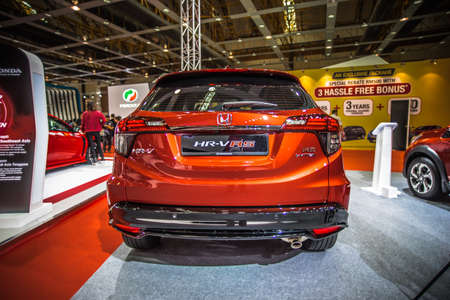 Kuala Lumpur, Malaysia â April 11, 2019 â Car and motocycle displayed at Moto Show in Kuala Lumpur. Exhibitors present most interesting aspects of the automotive industry. The image contains certain grain or noise and soft focus.のeditorial素材