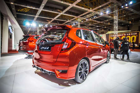 Kuala Lumpur, Malaysia â April 11, 2019 â Car and motocycle displayed at Moto Show in Kuala Lumpur. Exhibitors present most interesting aspects of the automotive industry. The image contains certain grain or noise and soft focus.のeditorial素材