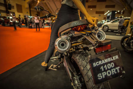 Kuala Lumpur, Malaysia â April 11, 2019 â Car and motocycle displayed at Moto Show in Kuala Lumpur. Exhibitors present most interesting aspects of the automotive industry. The image contains certain grain or noise and soft focus.のeditorial素材